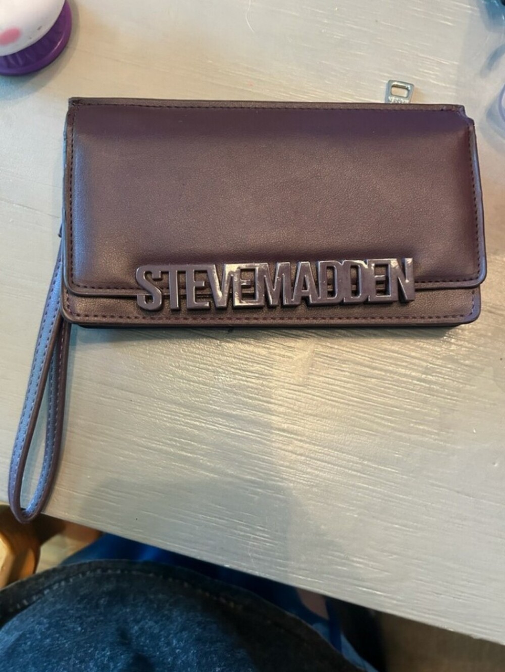 Steve Madden Plum Logo Wristlet